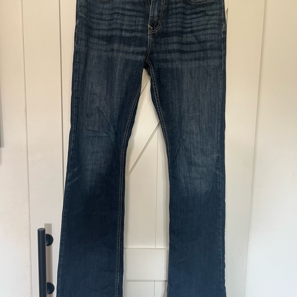 Cinch Ian Men's Bootcut Jeans in Dark Blue.
